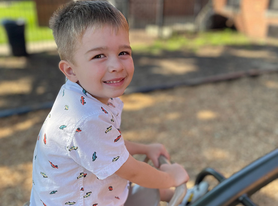 Toddler playing outside